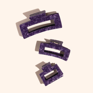 Drie haarklemmen in een vierkante vorm in de kleur Pretty Purple.